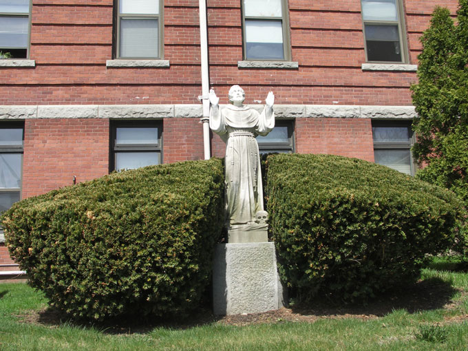 Monk and Skull statue in Worcester MA